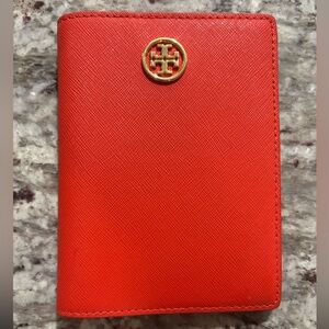 Tory Burch red passport wallet
